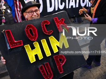 Demonstrators protest against Donald Trump outside of Madison Square Garden in New York, New York on October 27, 2024 as the former Presiden...