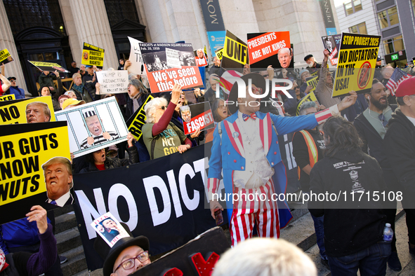 Demonstrators protest against Donald Trump outside of Madison Square Garden in New York, New York on October 27, 2024 as the former Presiden...