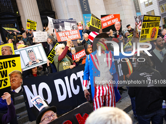 Demonstrators protest against Donald Trump outside of Madison Square Garden in New York, New York on October 27, 2024 as the former Presiden...