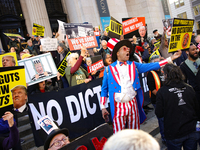 Demonstrators protest against Donald Trump outside of Madison Square Garden in New York, New York on October 27, 2024 as the former Presiden...