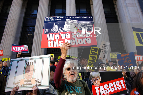 Demonstrators protest against Donald Trump outside of Madison Square Garden in New York, New York on October 27, 2024 as the former Presiden...