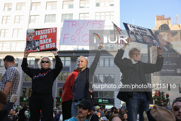 Demonstrators protest against Donald Trump outside of Madison Square Garden in New York, New York on October 27, 2024 as the former Presiden...