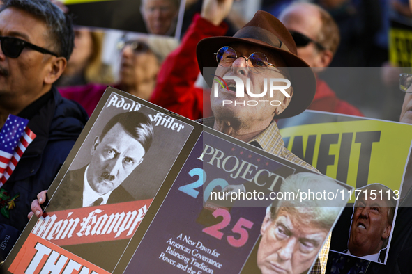 Demonstrators protest against Donald Trump outside of Madison Square Garden in New York, New York on October 27, 2024 as the former Presiden...