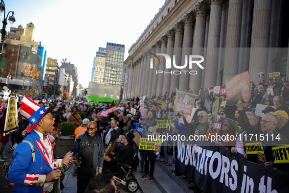 Demonstrators protest against Donald Trump outside of Madison Square Garden in New York, New York on October 27, 2024 as the former Presiden...