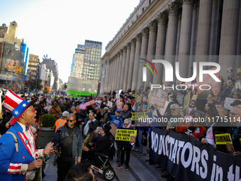 Demonstrators protest against Donald Trump outside of Madison Square Garden in New York, New York on October 27, 2024 as the former Presiden...