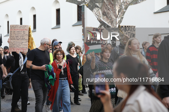 Participants of the protest against the suspension of asylum law under the slogan 'Fuck your borders' walk through the streets of the city i...