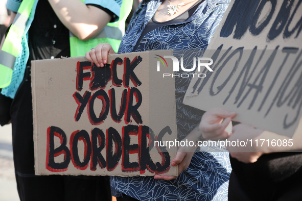 Participants in a protest against the suspension of asylum law under the slogan 'Fuck your borders' gather at the Main Square in Krakow, Pol...