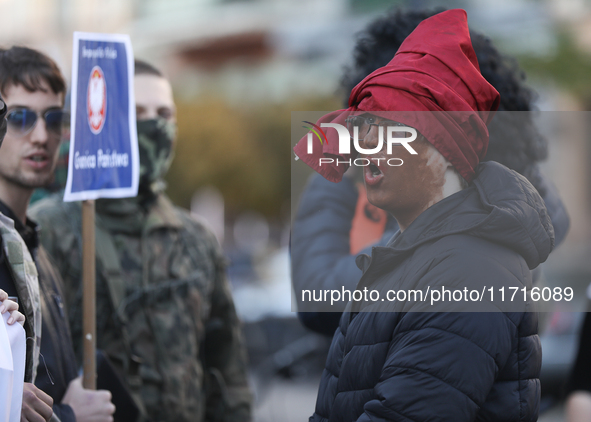 In Krakow, Poland, on October 27, 2024, participants of the counter-demonstration organized by the All-Polish Youth dress as refugees in bla...