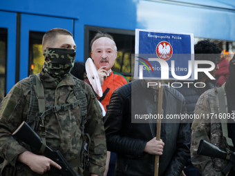 In Krakow, Poland, on October 27, 2024, participants of the counter-demonstration organized by the All-Polish Youth dress up Lukashenka's fa...