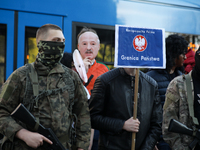 In Krakow, Poland, on October 27, 2024, participants of the counter-demonstration organized by the All-Polish Youth dress up Lukashenka's fa...