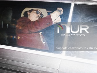 Johnny Depp leaves his hotel by car in Milan, Italy, on October 27, 2024 (