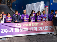 A press conference takes place near Exit 1 of Itaewon Station in Yongsan-gu, Seoul, South Korea, on October 28, 2024, to open the ''Path of...