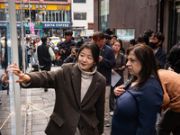 Artist Kwon Eun-bi introduces her work to Joanne Rached, the mother of foreign victim Grace Rached, at the opening ceremony of the new 10.29...