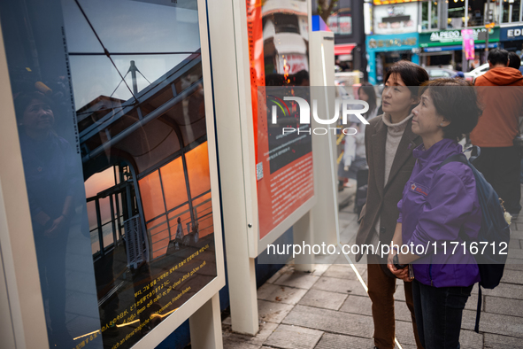 Artist Kwon Eun-bi introduces her work at the opening ceremony of the new 10.29 Path of Remembrance and Safety billboards in the Itaewon tra...