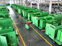 Workers produce power transmission equipment products at a workshop in Hai'an, Jiangsu province, China, on October 28, 2024. (