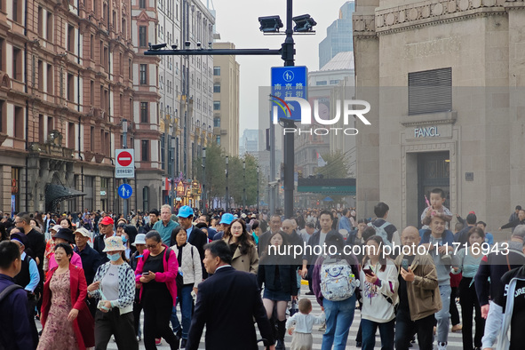 Chinese and foreign tourists bustle along the Nanjing Road Pedestrian Street in Shanghai, China, on October 28, 2024. 