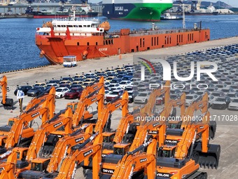 Chinese domestic cars gather at Yantai Port in Shandong Province, China, on October 28, 2024, and are exported via car transport ships. (