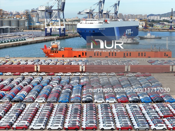 Chinese domestic cars gather at Yantai Port in Shandong Province, China, on October 28, 2024, and are exported via car transport ships. 