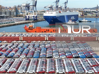 Chinese domestic cars gather at Yantai Port in Shandong Province, China, on October 28, 2024, and are exported via car transport ships. (