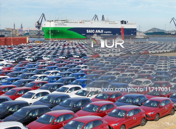 Chinese domestic cars gather at Yantai Port in Shandong Province, China, on October 28, 2024, and are exported via car transport ships. 