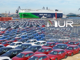 Chinese domestic cars gather at Yantai Port in Shandong Province, China, on October 28, 2024, and are exported via car transport ships. (