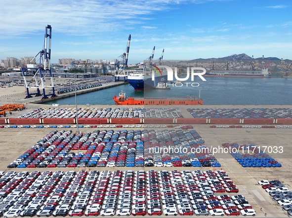 Chinese domestic cars gather at Yantai Port in Shandong Province, China, on October 28, 2024, and are exported via car transport ships. 