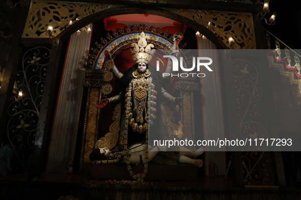 An idol of the Hindu goddess Kali is inside a ''pandal'' (a temporary platform), a decorated structure, ahead of the Kali Puja festival in K...