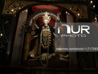 An idol of the Hindu goddess Kali is inside a ''pandal'' (a temporary platform), a decorated structure, ahead of the Kali Puja festival in K...