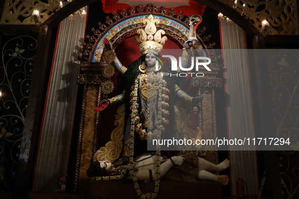 An idol of the Hindu goddess Kali is inside a ''pandal'' (a temporary platform), a decorated structure, ahead of the Kali Puja festival in K...