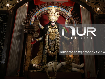 An idol of the Hindu goddess Kali is inside a ''pandal'' (a temporary platform), a decorated structure, ahead of the Kali Puja festival in K...