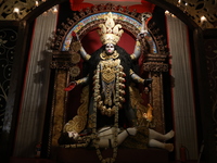 An idol of the Hindu goddess Kali is inside a ''pandal'' (a temporary platform), a decorated structure, ahead of the Kali Puja festival in K...