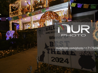 In the backyards of houses in the Celebration, FL, region, people create scary scenes with inflatable and luminous dolls for Halloween on Su...