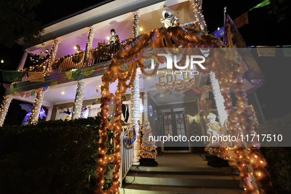 In the backyards of houses in the Celebration, FL, region, people create scary scenes with inflatable and luminous dolls for Halloween on Su...