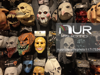 Masks display at a shop selling costumes in preparation for Halloween in Toronto, Ontario, Canada, on September 27, 2024. (