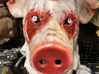 A pig mask is displayed at a shop selling costumes in preparation for Halloween in Toronto, Ontario, Canada, on September 27, 2024. (