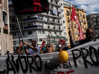 A demonstration takes place in Naples, Italy, outside the Poggioreale prison, where unemployed and working people gather to protest against...