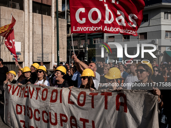 A demonstration takes place in Naples, Italy, outside the Poggioreale prison, where unemployed and working people gather to protest against...