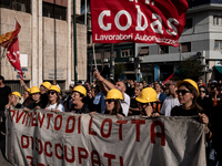 A demonstration takes place in Naples, Italy, outside the Poggioreale prison, where unemployed and working people gather to protest against...