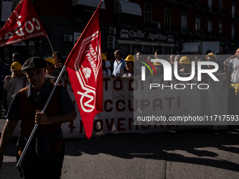 A demonstration takes place in Naples, Italy, outside the Poggioreale prison, where unemployed and working people gather to protest against...