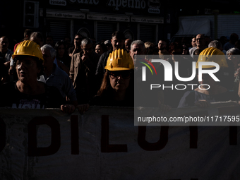 A demonstration takes place in Naples, Italy, outside the Poggioreale prison, where unemployed and working people gather to protest against...