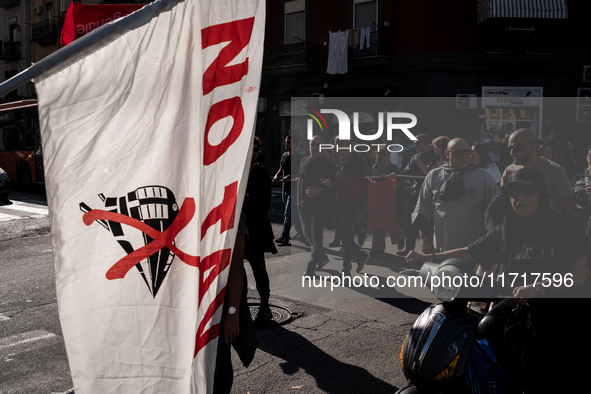 A demonstration takes place in Naples, Italy, outside the Poggioreale prison, where unemployed and working people gather to protest against...