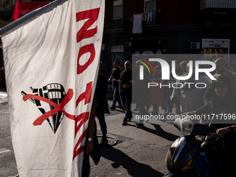 A demonstration takes place in Naples, Italy, outside the Poggioreale prison, where unemployed and working people gather to protest against...