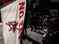 A demonstration takes place in Naples, Italy, outside the Poggioreale prison, where unemployed and working people gather to protest against...