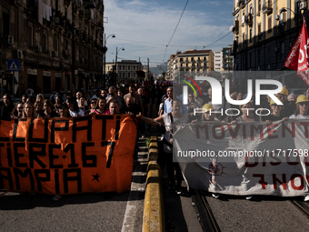 A demonstration takes place in Naples, Italy, outside the Poggioreale prison, where unemployed and working people gather to protest against...