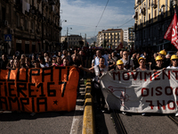 A demonstration takes place in Naples, Italy, outside the Poggioreale prison, where unemployed and working people gather to protest against...