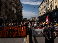 A demonstration takes place in Naples, Italy, outside the Poggioreale prison, where unemployed and working people gather to protest against...