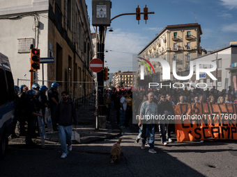 A demonstration takes place in Naples, Italy, outside the Poggioreale prison, where unemployed and working people gather to protest against...