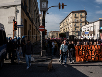 A demonstration takes place in Naples, Italy, outside the Poggioreale prison, where unemployed and working people gather to protest against...