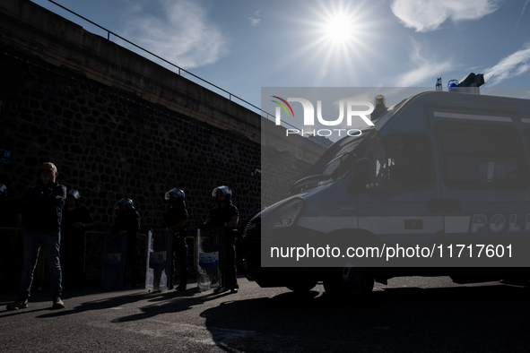 A demonstration takes place in Naples, Italy, outside the Poggioreale prison, where unemployed and working people gather to protest against...