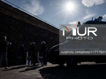 A demonstration takes place in Naples, Italy, outside the Poggioreale prison, where unemployed and working people gather to protest against...